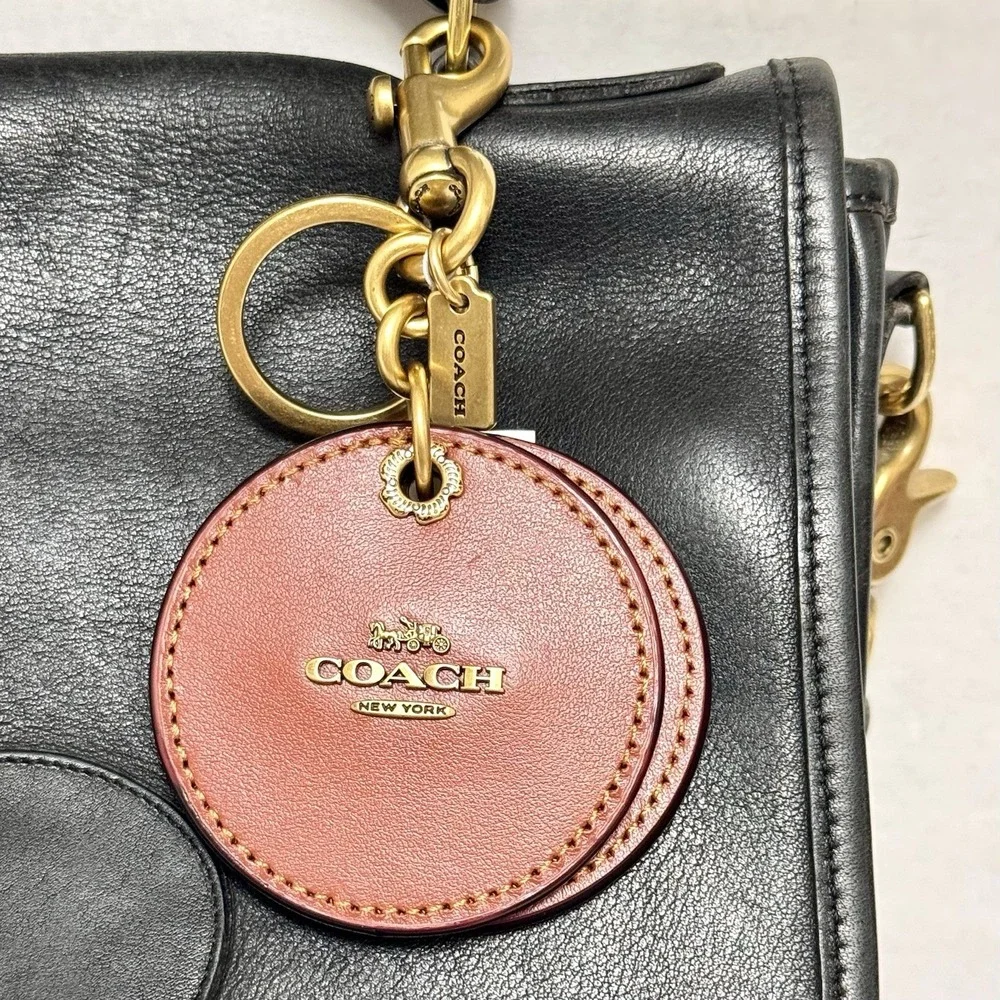 Coach round mirror